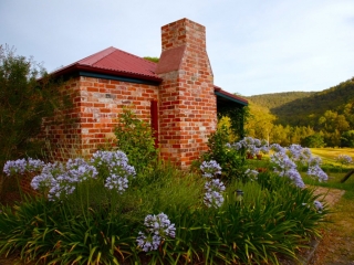 Vineyard, valley and mountain views from Howell's and Goldmsith's Cottages Cedar Creek Cottages, Hunter Valley Accommodation with Spa