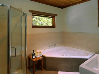 Grove Cottage main bathroom with spa bath Cedar Creek Cottages, Hunter Valley Accommodation Cottages