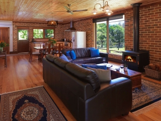Grove Cottage lounge room and open-plan kitchen Cedar Creek Cottages, Hunter Valley Accommodation Cottages