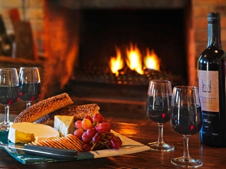 Indulge in wine and cheese in front of the wood fire Cedar Creek Cottages, Wollombi Accommodation