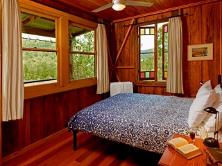 Shadforth's Cottage main bedroom with views over our vineyards Cedar Creek Cottages, Hunter Valley Accommodation with Spa
