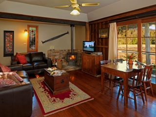Timbercutter's Cottage lounge room overlooking our vineyards Cedar Creek Cottages, Hunter Valley Cottages